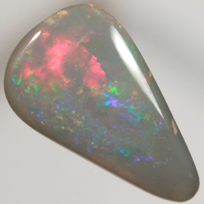 SOLID SEMI BLACK OPAL Sparkles of bright crisp red and green
